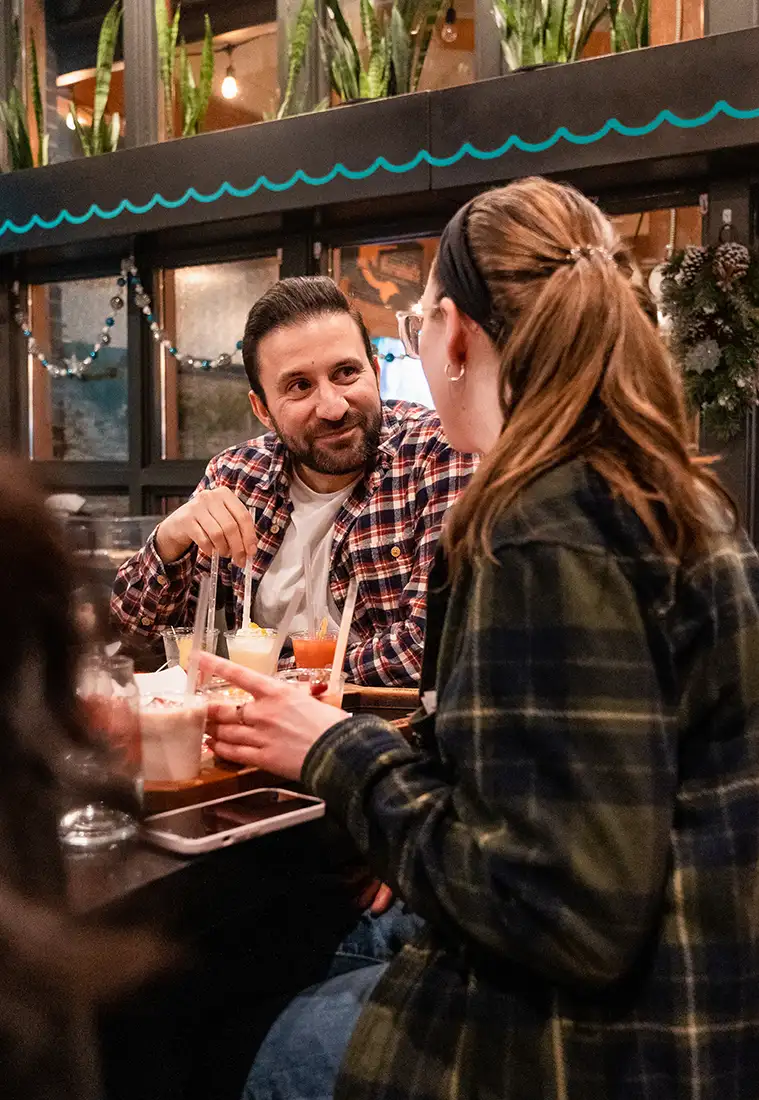 Couple sitting at bar