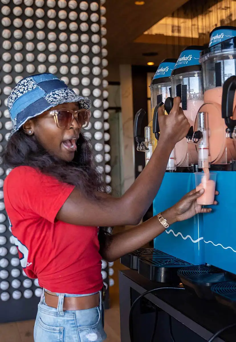 Pouring a drink from a machine