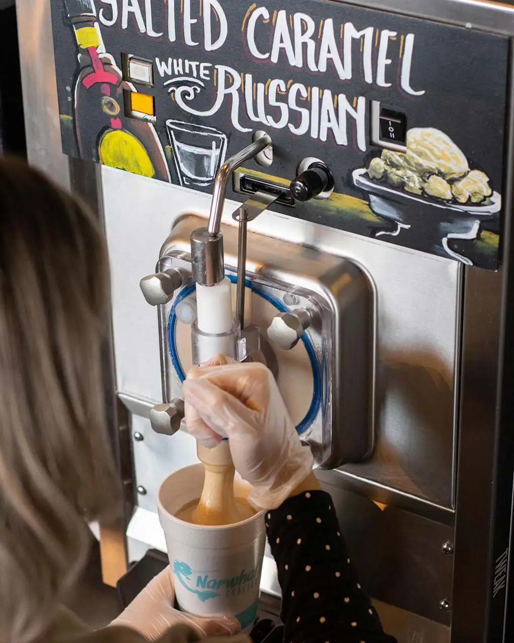 Employee pouring cocktail